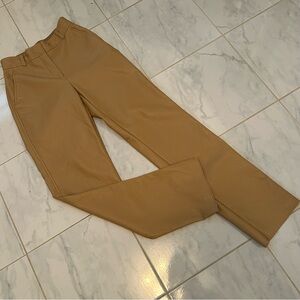 Babaton Aritzia Tan “vegan leather” Pants. Raw hem at bottom.  EUC!
